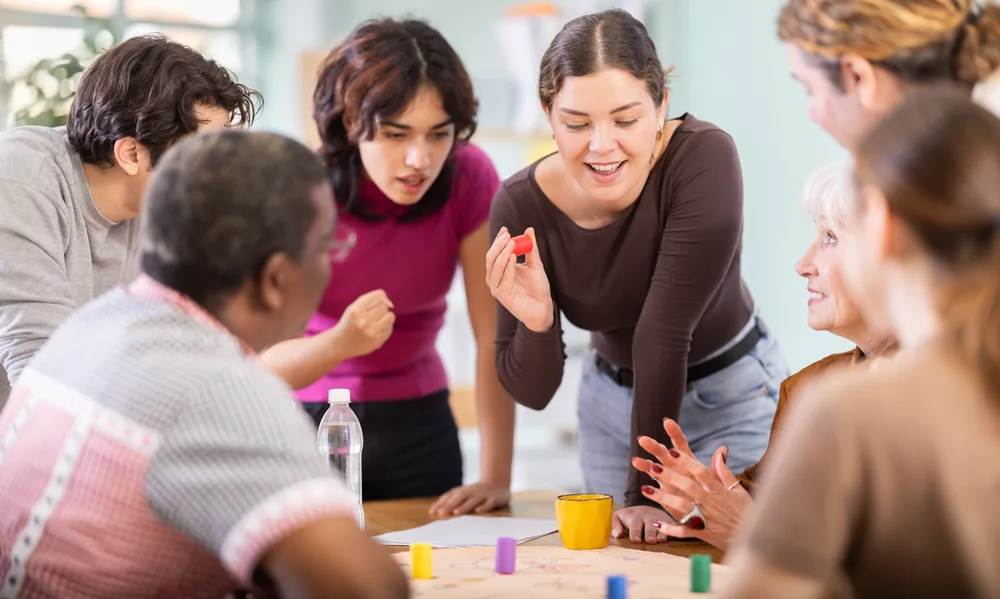 Colleagues sharing ideas around a table